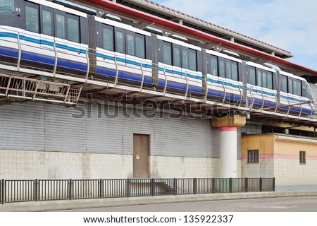 Monorail train on railway, view from below