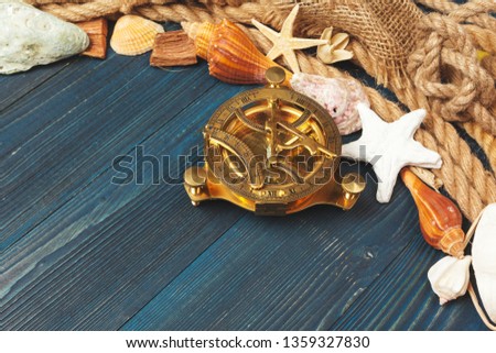 Nautical background. Sailing rope with a compass