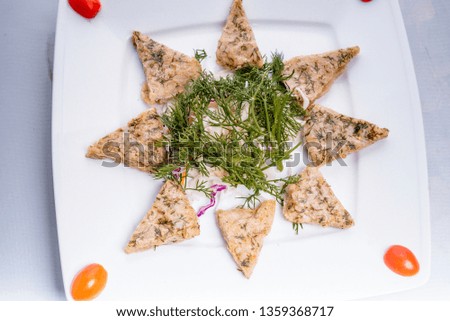 grilled chopped fish (Fried red fish cutlets) on white background 