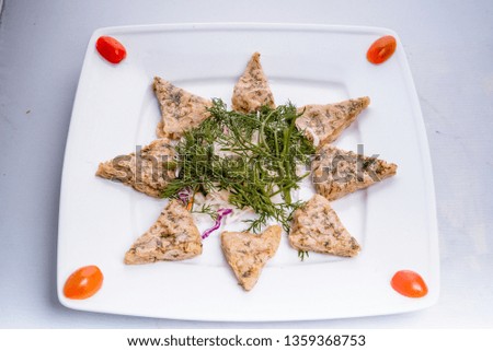 grilled chopped fish (Fried red fish cutlets) on white background 