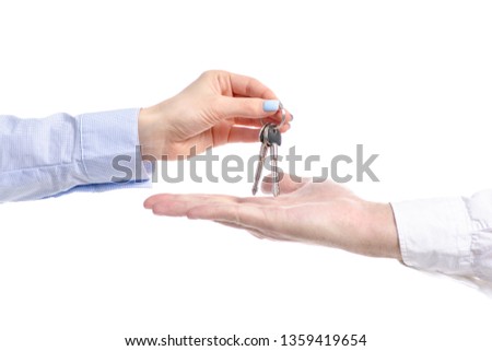 Hand give key to hand on white background isolation