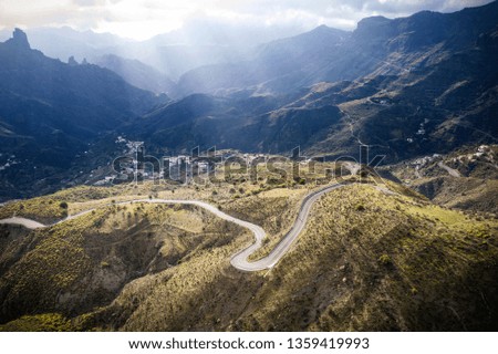 Aerial photo of summer road on Gran Canaria island. Free space for your decoration. Mountains landscape and sunny day. 