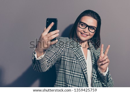 Close up photo portrait of charming attractive lovely sweet dream dreamy fashionable trendy she her lady giving v-sign taking picture isolated grey background copy space