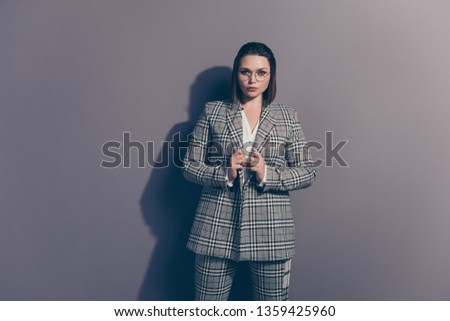 Portrait of her she cool beautiful attractive classy bossy lady busy body shark wearing checked blazer qualified specialist agent broker isolated over gray violet pastel background