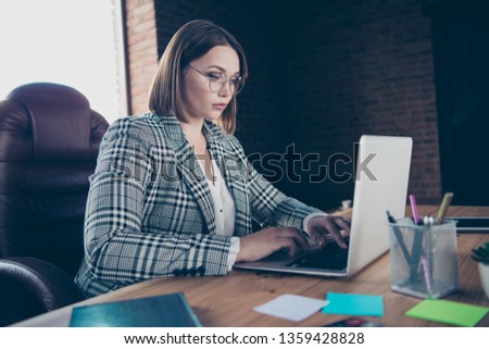 Close up photo beautiful she her business lady chief use user modern technologies check new letters currency email strict notebook table sit big office chair wear formal wear checkered plaid suit