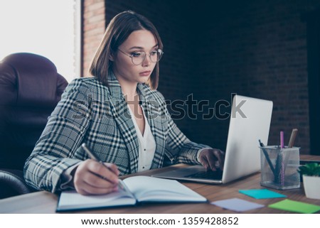 Close up photo beautiful strict she her business lady chief use user modern technologies noticing corporate company novelty notebook table sit big office chair wear formal wear checkered plaid suit