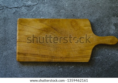 Wooden board on marble background
