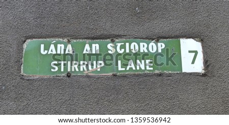Stirrup Land road sign in English and Irish language.