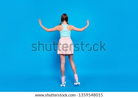 Full length back rear behind body size view photo she her lady hide face stand turned legs vintage rollers activity way life wear casual street summer pastel dress clothes isolated blue background