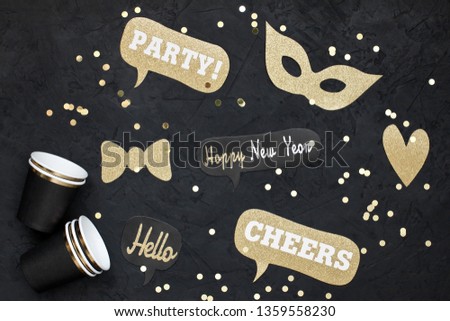 Carnival party background with confetti and paper accessories. Festive concept, top view