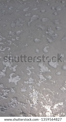 ice, drops of frozen water on metal.