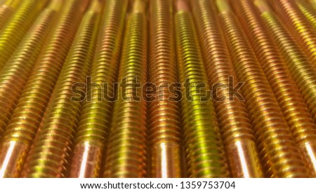 Close up of metal bolts texture on blur image. 