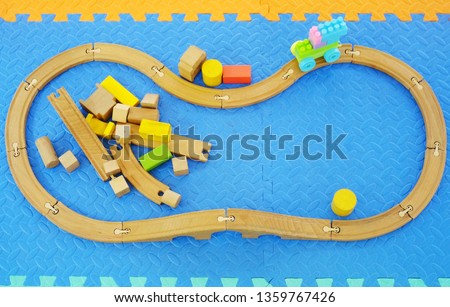 Wooden Toy​ on the floor 
