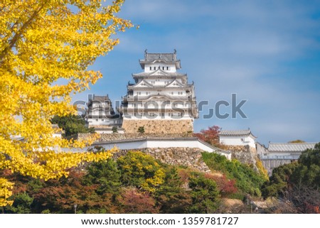 Himeji Castle situated in the Hyogo Prefecture of Japan, shown here in autumn, is also called the White Egret Castle because of its brilliant white exterior and resemblance with a bird taking flight.