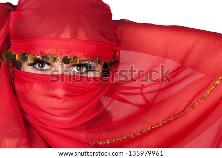 Portrait of young woman wearing traditional red veil