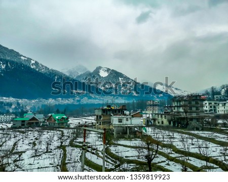 Amazing snowfall landscape view with beautiful mountains and hills.
