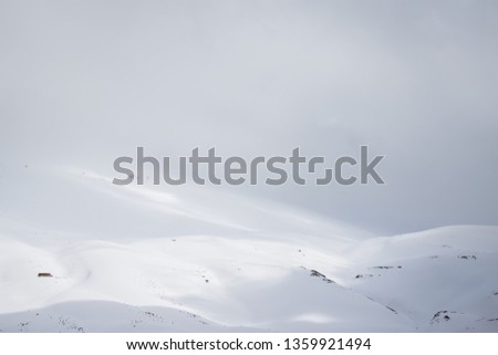 This is a capture for mountains covered with white snow located in north Lebanon, the shot was taken in late march 2019 