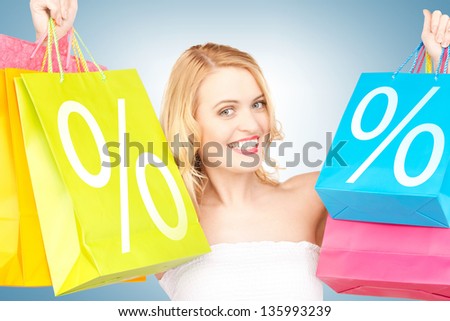 picture of attractive woman with shopping bags