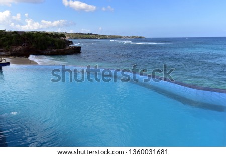 Outdoor swimming pool towards the sea at the west part of Nusa Lembongan Island, Indonesia