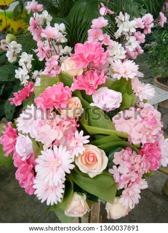 Beautiful multicolored artificial flowers bouquet.
