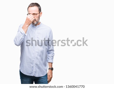 Middle age hoary senior man wearing glasses over isolated background tired rubbing nose and eyes feeling fatigue and headache. Stress and frustration concept.