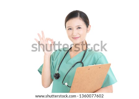 Smiling Asian medical doctor.