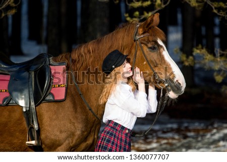 photo shoot with a horse and a blonde