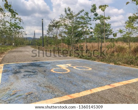 clear concrete bike road on sunny day at Thailand