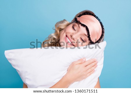 Close up photo beautiful funky her she lady hands arms palms hold cuddle big large pillow it's high time pause break wear sleeping pink mask casual white t-shirt clothes isolated blue background Royalty-Free Stock Photo #1360171511