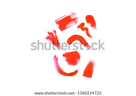 Smear of coral paint isolated on white background