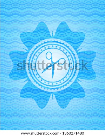 scissors icon inside water badge.