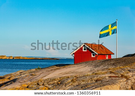 Red House in Sweden Royalty-Free Stock Photo #1360356911