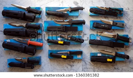 many different types of diving knife Royalty-Free Stock Photo #1360381382