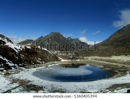 Sela Pass (more appropriately called Se La, as La means Pass) is a high-altitude mountain pass located on the border between the Tawang and West Kameng Districts of Arunachal Pradesh state in India. Royalty-Free Stock Photo #1360405394