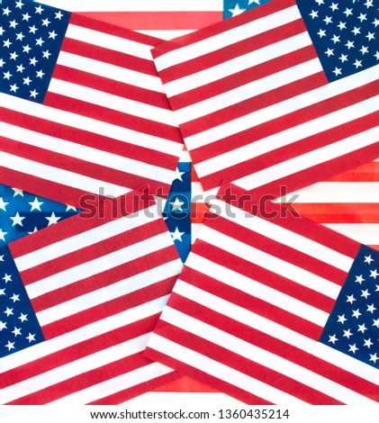 background wallpaper- multiple small American flags at different angles overlapping each other