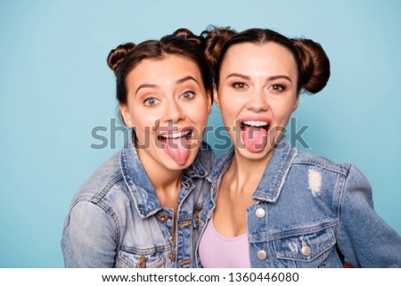 Close up photo of nice satisfied teenagers teens isolated fooling rejoicing hipsters having showing free time weekends holiday relaxing dressed in denim outfit on pastel background