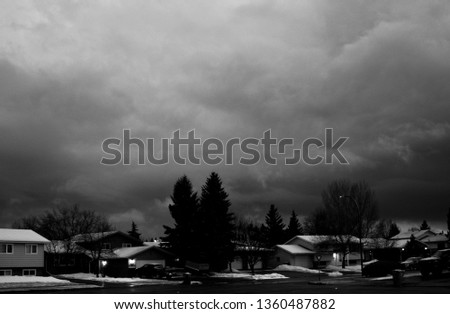 Cloudy Skies Over The Neighborhood, In Monochrome