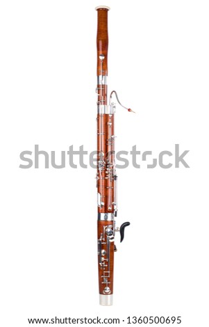Wooden bassoon isolated on a white background. Music instruments. Royalty-Free Stock Photo #1360500695