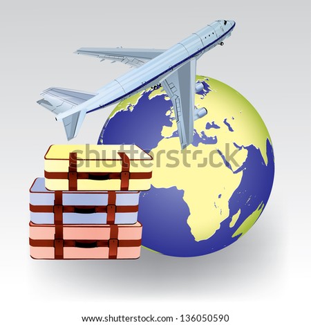 Concept of air travel with model of Earth, airplane and luggage isolated on white background.