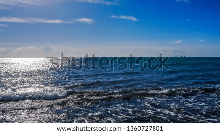 seascape with tankers on horizon