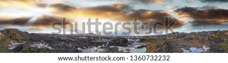 Te Puia National Park in New Zealand. Panoramic aerial view of geysers and lakes at sunset