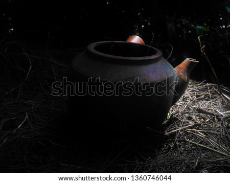 earthenware under the tree for offerings