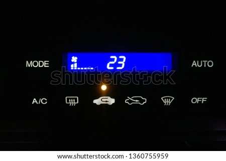 Air conditioner indicator automobile buttons closeup. Selective focus