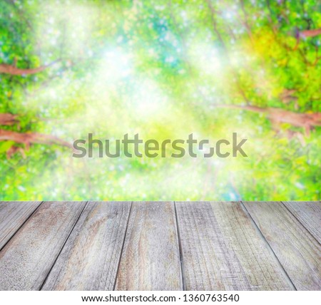 Wood floors with blurred images of beautiful back scenes And have space for adding more pictures and letters