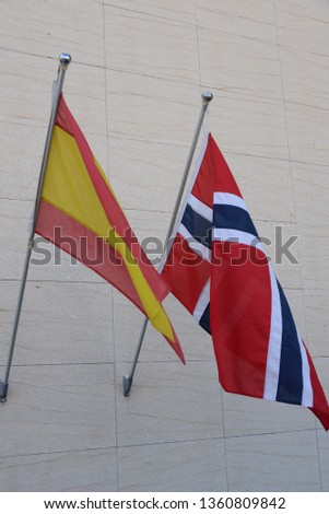 the spanish and norwegian flag in the wind, Costa Blanca, Spain