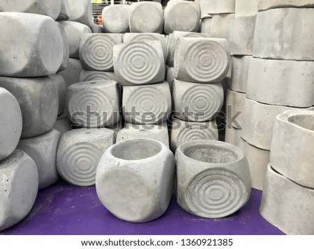 Cement flower pots selling in gardening store