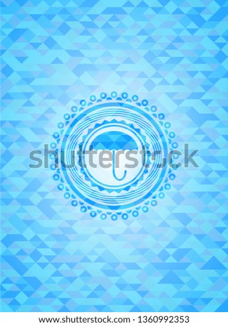 umbrella icon inside sky blue mosaic emblem