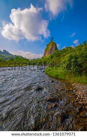 Wonderful daylight view in beautiful river and mountain. This photo take in the one of beautiful place West Sumatra Indonesia.