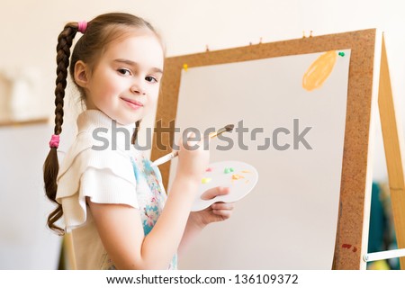 portrait of a girl standing next to his easel, a drawing lesson