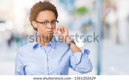 Young beautiful african american business woman over isolated background mouth and lips shut as zip with fingers. Secret and silent, taboo talking